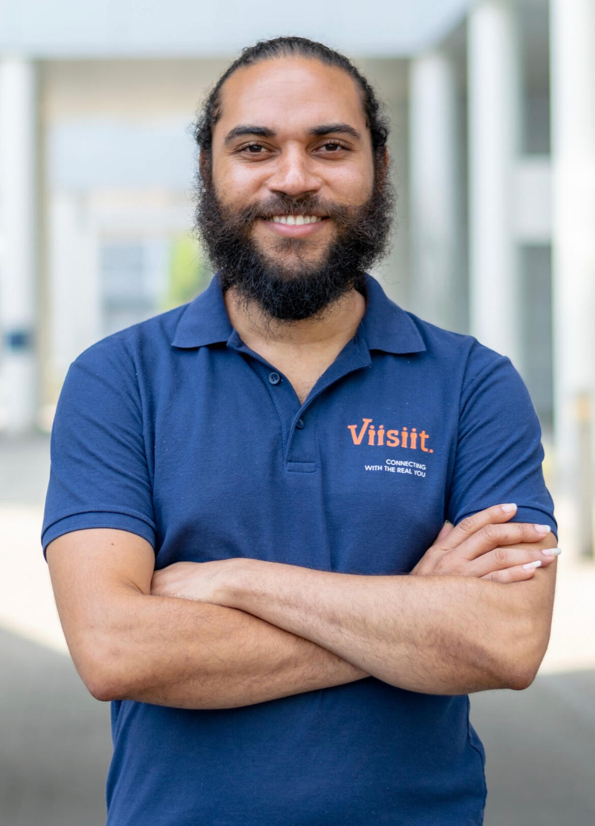 Alvin wearing a sample polo-shirt for the Viisiit.® uniform